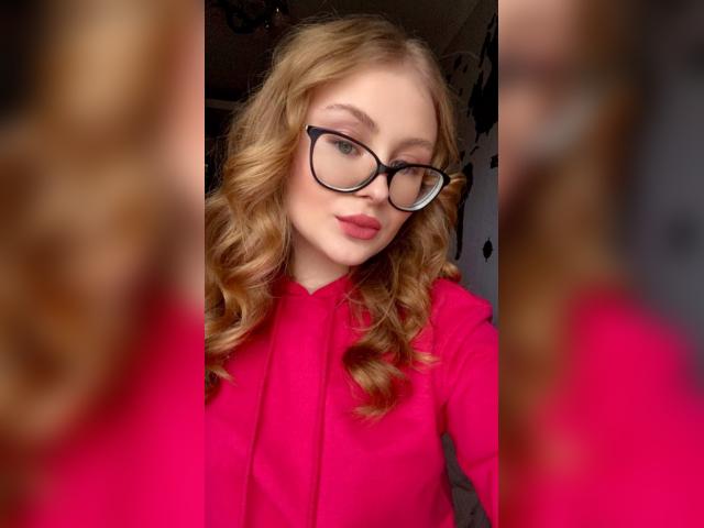 Explore your dreams with webcam model LadyRed1919