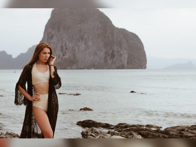 Explore your dreams with webcam model Briele: Travel