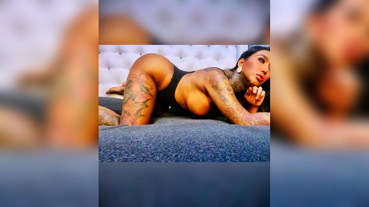 Webcam chat profile for TopDominantTS: Piercings & tattoos