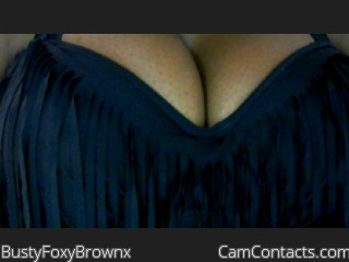 Webcam model BustyFoxyBrownx from CamContacts
