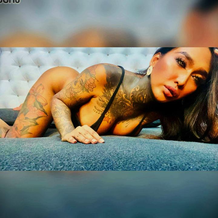 Webcam chat profile for TopDominantTS: Piercings & tattoos